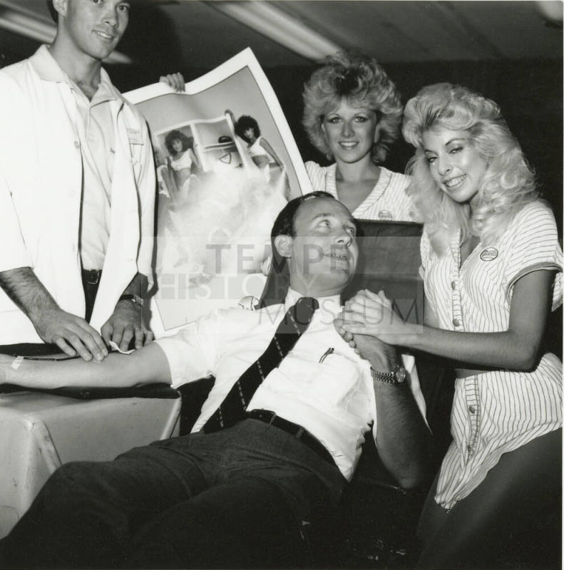 Unidentified Group of People Assisting In Blood Donation - (1 of 2)