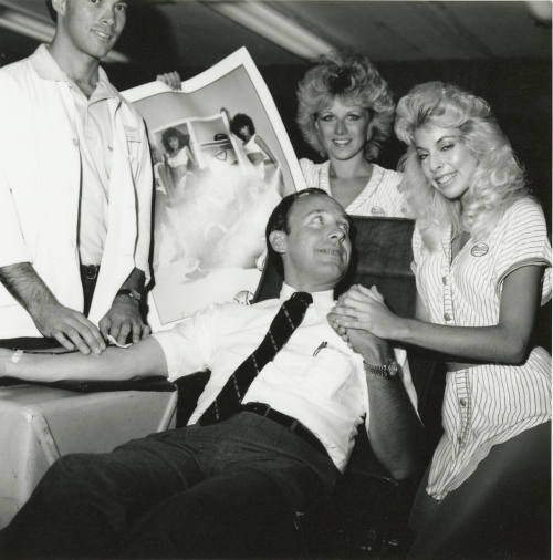 Unidentified Group of People Assisting In Blood Donation - (1 of 2)