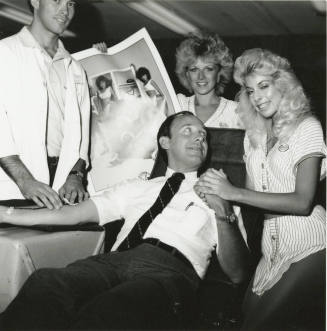 Unidentified Group of People Assisting In Blood Donation - (1 of 2)