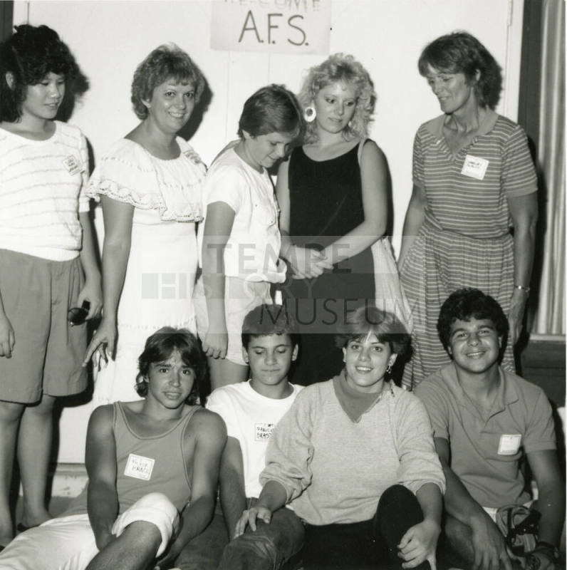 Unidentified Group of 9 In Front of A.F.S. Sign