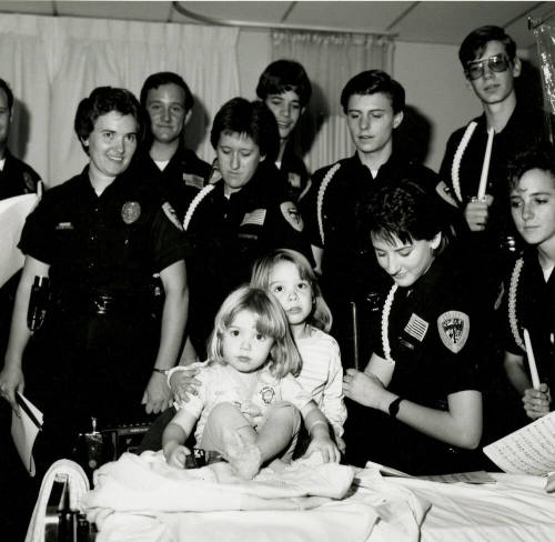 Tempe police Dept. Explorers at st.Luke's- Tempe Daily News, December 28 1985