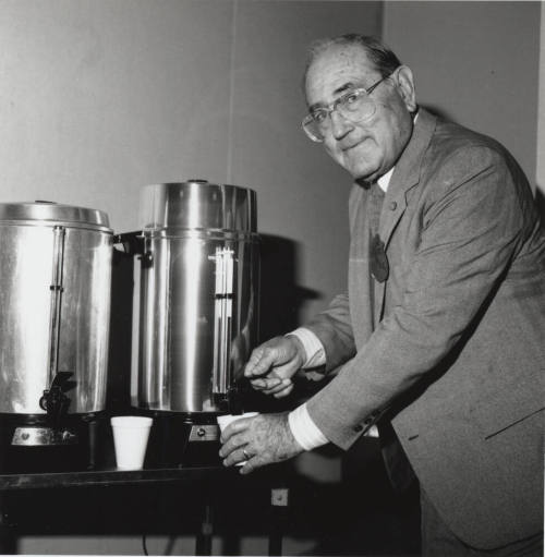 Unidentified Man at Coffee Dispenser
