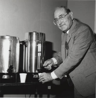 Unidentified Man at Coffee Dispenser