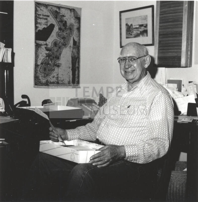 Unidentified Man seated at Desk