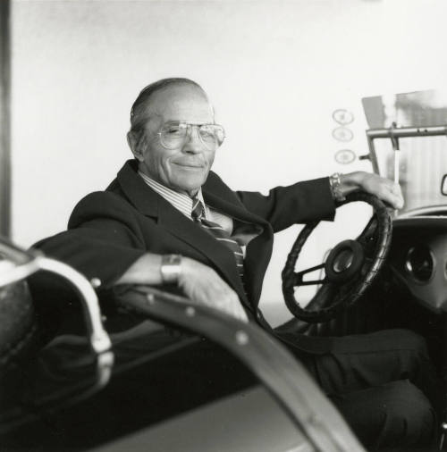Leonard Monti in his 1966 Excalibur