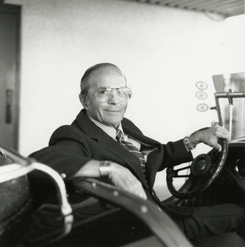 Leonard Monti in his 1966 Excalibur