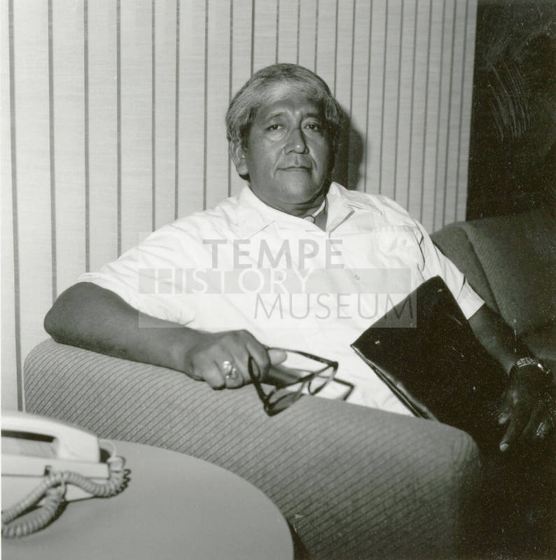 Unidentified Man Seated on a Couch