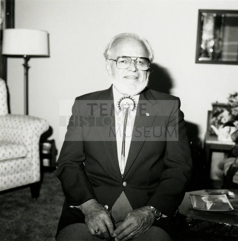 Older man seated in living room