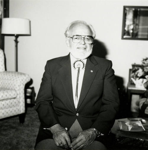Older man seated in living room