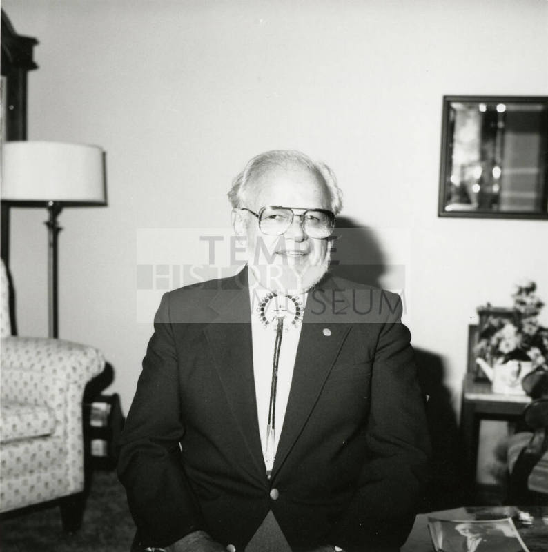 Older man seated in living room