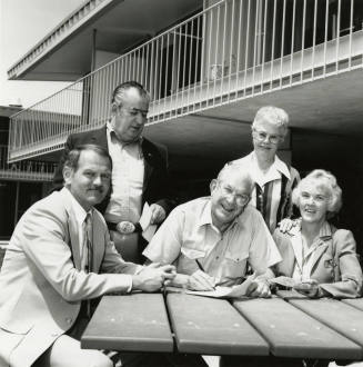Unidentified Group of 3 Men & 2 Women Signing Papers