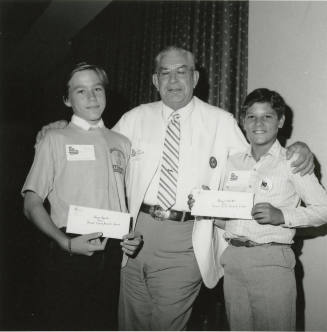 Two young men receive "Say no to drugs and alcohol" awards