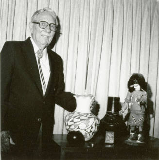 Unidentified Man with Native American Art Work