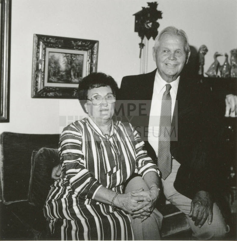 Unidentified couple in living room at home (2 of 2)