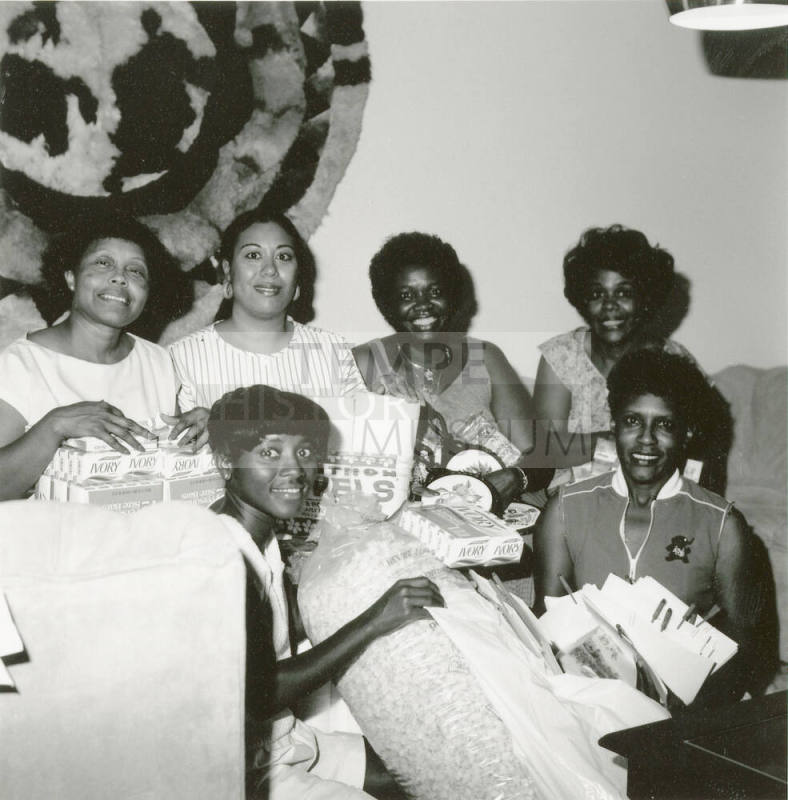 Ladies of Delta Sigma Theta Tempe Alumnae assembling donation boxes for the needy