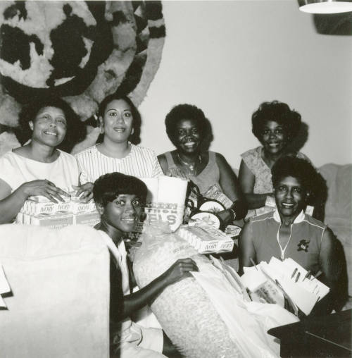 Ladies of Delta Sigma Theta Tempe Alumnae assembling donation boxes for the needy
