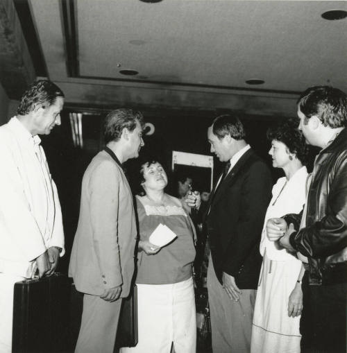 A group of people talking.