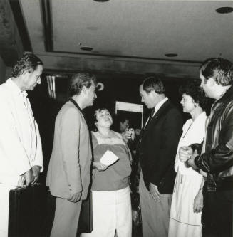 A group of people talking.