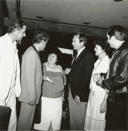 A group of people talking.