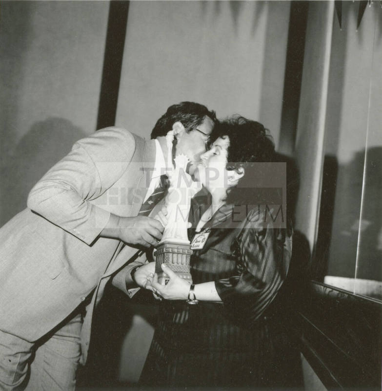 Woman getting an award.