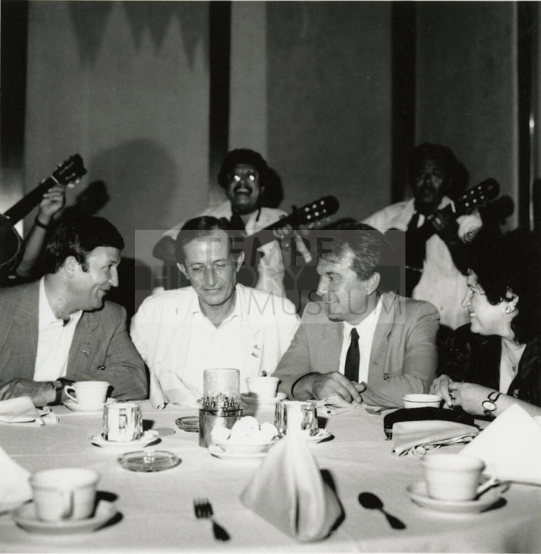 Man sitting at a table.