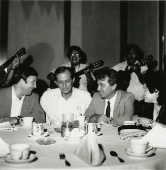 Man sitting at a table.