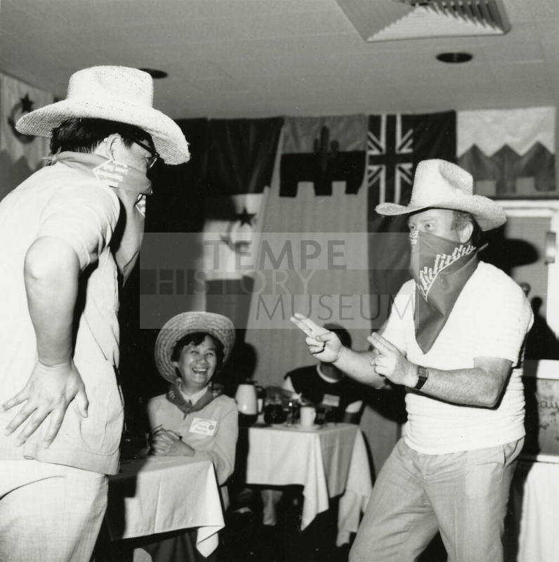 Grown men playing cowboys.