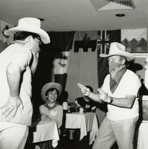 Grown men playing cowboys.
