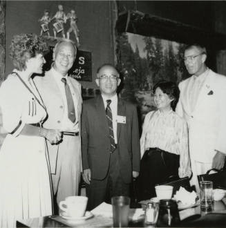 Group of people getting a picture.