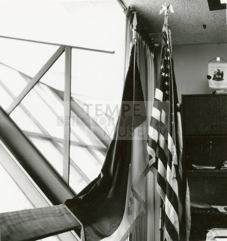 Taking a picture of the flag.