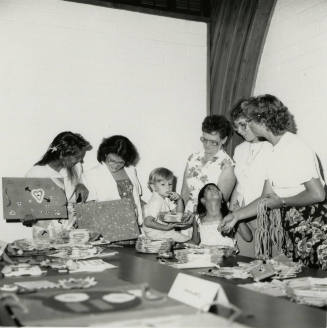 Gathering of women & children (1of 2)