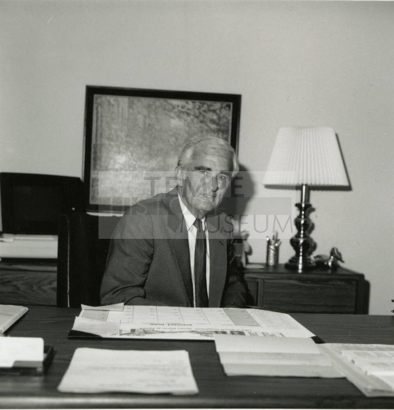 Unidentified man at a desk