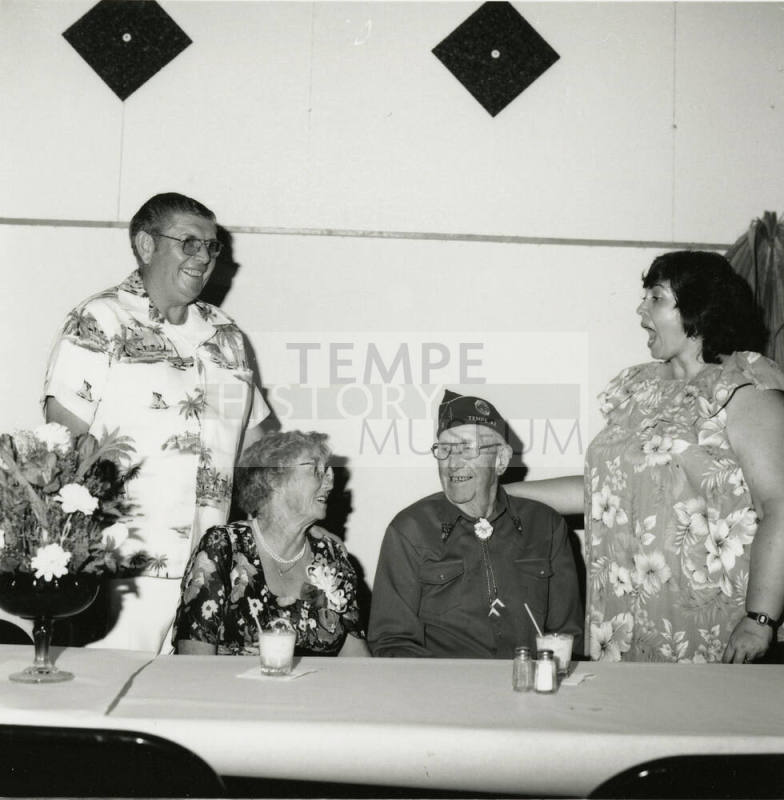 Four unidentified people at a table