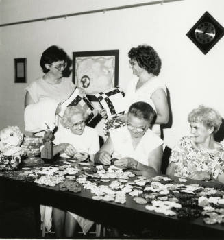 Five unidentified ladies at a craft table