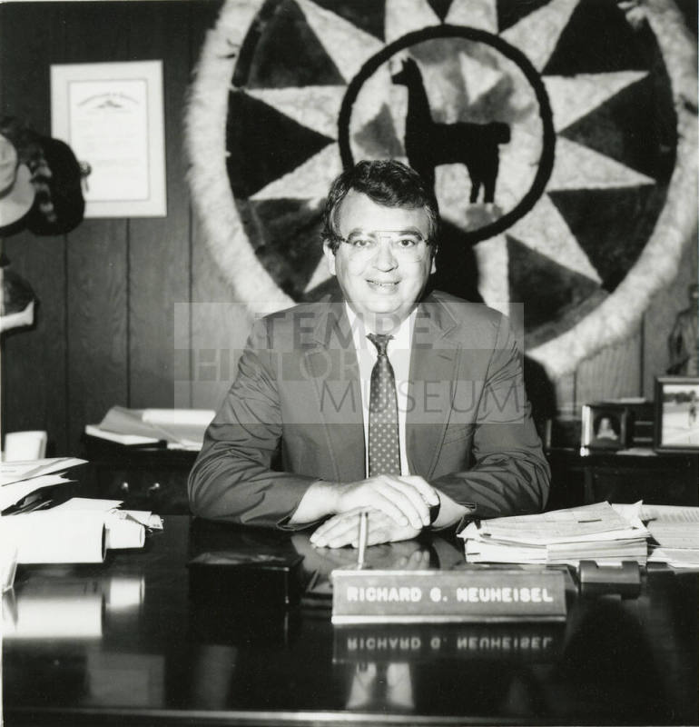 Richard (Dick) Neuheisel at a desk