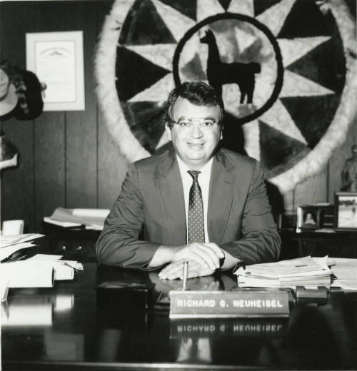 Richard (Dick) Neuheisel at a desk