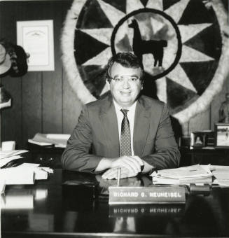Richard (Dick) Neuheisel at a desk