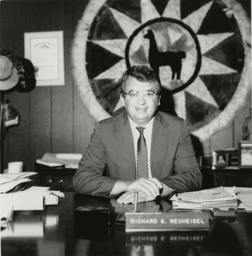 Richard (Dick) Neuheisel at a desk