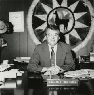 Richard (Dick) Neuheisel at a desk