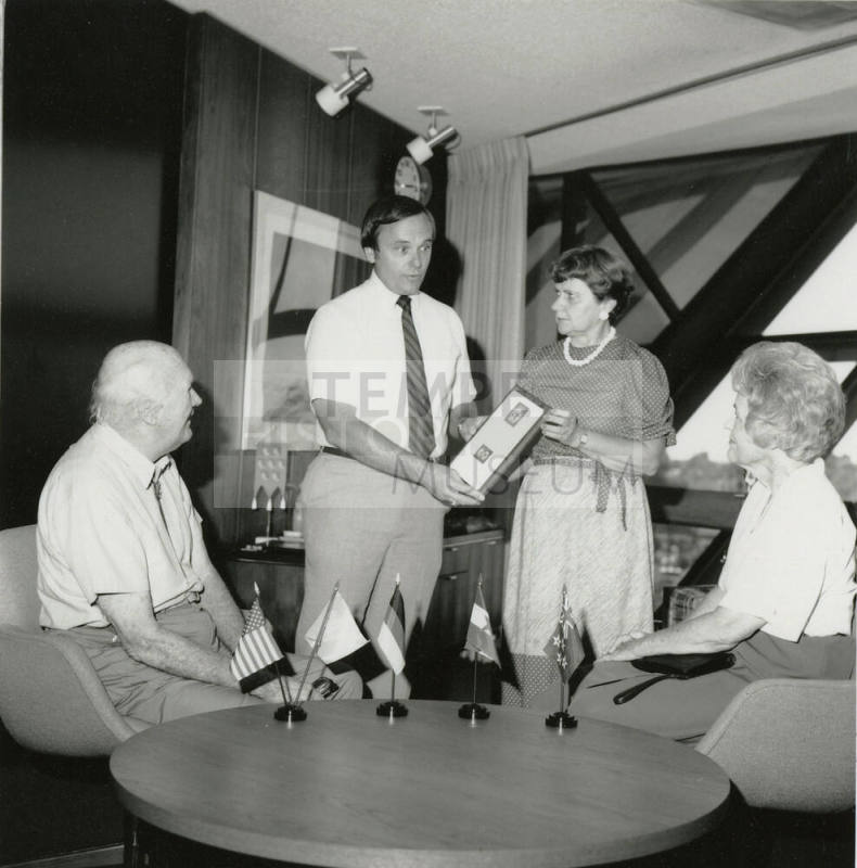 Mayor Mitchell Presents a Plaque to Unidentified Woman