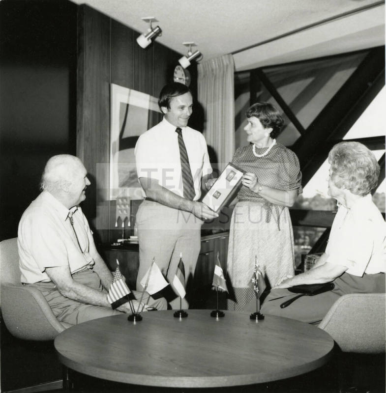 Mayor Mitchell Presents a Plaque to Unidentified Woman
