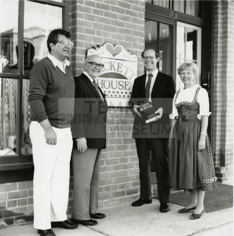 David Eisenhower Dick Neuheisel, Howard Pyle, and Jane Neuheisel, standing in front of Hackett House, Sister City Oktoberfest
