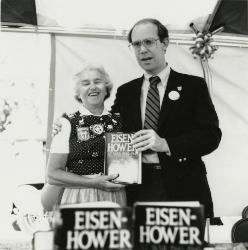 David Eisenhower and a woman at a book signing, Sister City Oktoberfest