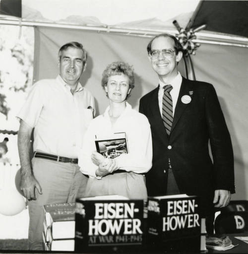 David Eisenhower and a couple at a book signing, Sister City Oktoberfest