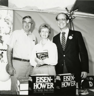 David Eisenhower and a couple at a book signing, Sister City Oktoberfest
