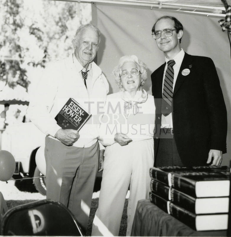 David Eisenhower and a couple at a book signing, Sister City Oktoberfest