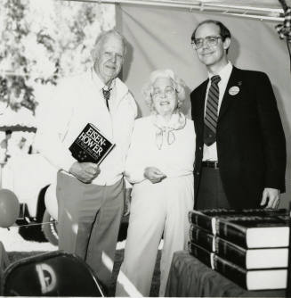 David Eisenhower and a couple at a book signing, Sister City Oktoberfest