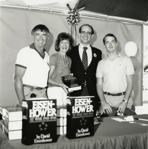 David Eisenhower and a family at a book signing, Sister City Oktoberfest