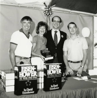 David Eisenhower and a family at a book signing, Sister City Oktoberfest