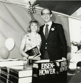 David Eisenhower and a woman at a book signing, Sister City Oktoberfest
